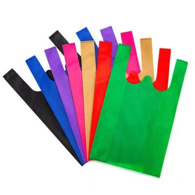 China 100% Eco-friendly Reusable Customs Printed To Recycle Non Woven Non Woven Vest Bag Promotion T-shirt Bag for sale