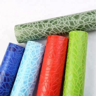 China Factory Manufacture Waterproof Colored Embossed Spunbond 100% Polypropylene Non Woven Fabric for sale