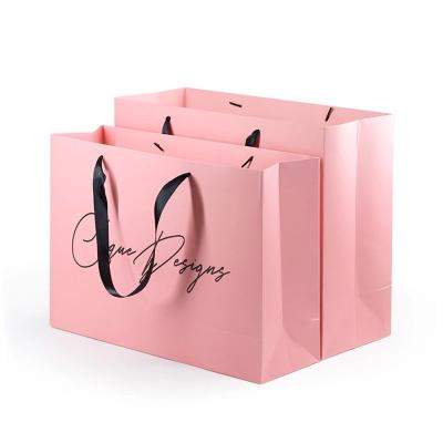 China Recyclable personalized luxury brand boutique gift packaging customized jewelry small size black paper bag with logo for sale