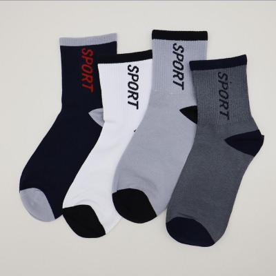 China Athletic Wholesale Sports Stockings Stripes With Words Sweat Absorption Deodorant Cotton Leg Socks For Men for sale