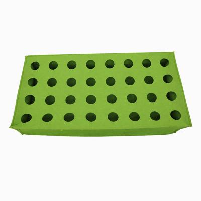 China Eco-Friendly 50x10x20 Multi-hole Vegetable Garden Breathable Fabric Raised Bed Tray Felt To Grow Bed Bags for sale