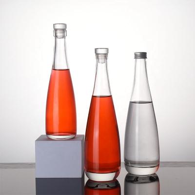 China JO Beverage Hot Sale 330ml 500ml Clear Wine Fruit Empty Ice Soft Drink Mineral Water Glass Bottles For Liquor Drinks for sale