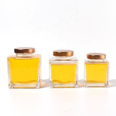 China Food JO Customize Flat Saffron Honey Candy Glass Jars With Tin Cap Square 4oz 7oz 10.5oz 14oz Mini Airtight Food Containers Bottles for sale