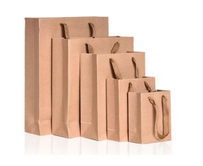 China Wholesale Recyclable Luxury Black Shoes Clothes Kraft Paper Bags Printed Custom Logo Packaging Paper Bag Clothing Shopping Gift Jewelry for sale