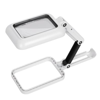 China Acrylic +ABS 18 LED Light Magnifier Portable Magnifier With Table Light Desk Type Lamp Lens Handheld Foldable Magnifier for sale