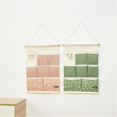 China Wall Art Decor Wholesale Small Storage Pocket Wall Hanging Dool Sack Cloth Hanging Bag for sale