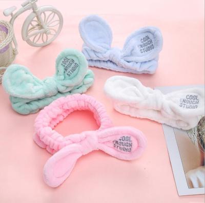 China OEM Fashion Flannel Custom Cool Embroidery Headband Cute Logo Face Wash Elastic Hair Band For Girls Women for sale