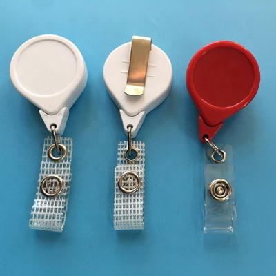 China Swivel Clip On Back Retractable ID Card Holder Badge Reel Christmas Nurse Badge Reel With Clip for sale