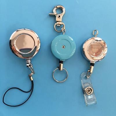 China Swivel Clip On Back Retractable Nurse Badge Reel Metal Badge Holder Pull Christmas for sale