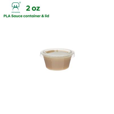 Cina 2oz 60ml Disposable PLA Disposable Eco-Friendly Degradable Plastic Mini Food Cup Containers For Sauce With Lids Food Sauce Container in vendita