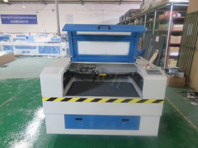 China Small size Mini Co2 Laser Cutter Equipment CNC laser engraver for glass fabric for sale