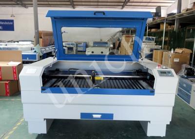 China 1300*900mm Small Type Wood Acrylic MDF Plastic Cloth Laser Engraving Cutting Machine for sale