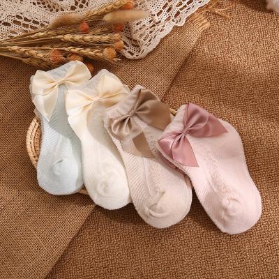 China Sale Baby Girl Breathable Top Baby Style Spanish Knee High High Booties Cotton Soft Organic Baby Stockings Bow Ruffle Socks for sale