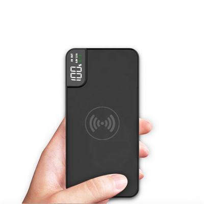 China Fast Charging Support Top Selling Products 2021 Colorful Wireless Power Bank 10000mah With Hidden Phone Holder for sale