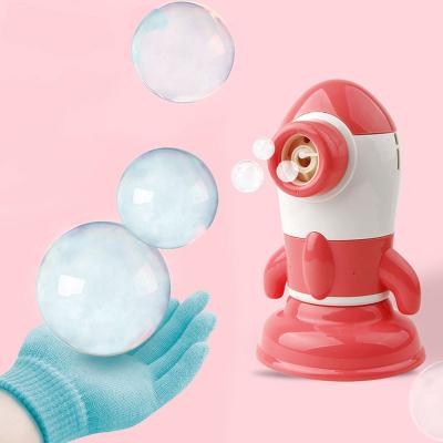 China Rocket Shape Bubble Machine Toy Outdoor Summer Aviation Game Play Toys Party Electric Light and Music Bubble Toys for Children for sale