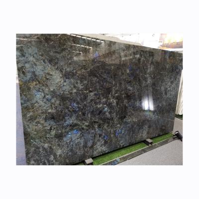 China Traditional Blue Lemurian Labradorite Madagascar Lumen Granite Lemurian Blue Granite Slab Blue Lemurian Granite for sale