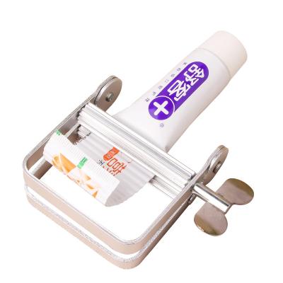 China Universal Viable Metal Tube Squeezer Cosmetics Detergent Extruder Toothpaste Squeezer Dispenser for sale