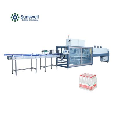 China Glass Bottle Wine Automatic Water Bottle Shrink Wrapping Machine PET Bottle Soft Drink Shrink Wrap Packing Machines for sale