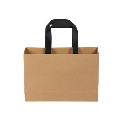 China New Gold Biodegradable Logo Hot Foiled Stamping Black Matt Kraft Paper Bag for sale