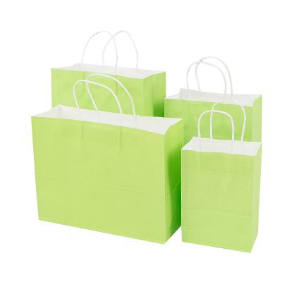 China Environmental Friendly Customize Design Kraft Paper Gift Fancy Shopping Paper Bag for sale