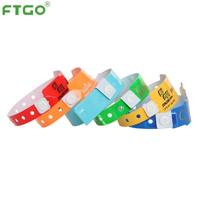 China China FTGO One Time PVC Waterproof Plastic One Time Use ID Wristband For Bar Hotel Custom for sale