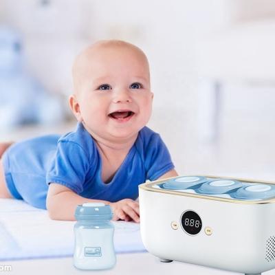 China BPA Free Feeding Supplies Mini Portable Mini Milk Cooler Electric Baby Food Warmer Breastmilk Bottle Warmer Instant Feeding Bottle Cooler for sale