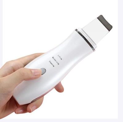 China Handheld Anti-Puffiness Ultrasonic Skin Machine Home Pore Remover Vibrating Blackhead Rub Remover for sale