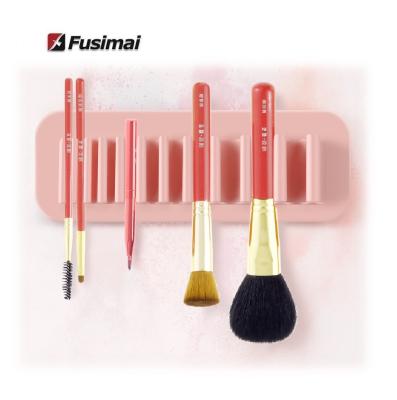 China Minimalist Fusimai Automatic Toothbrush Storage Adsorption Shelf Box Silicone Makeup Brush Drying Rack for sale