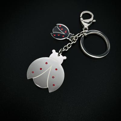 China Custom Keychains Manufacturers Wholesale Fashion High Grade Promotion Fashion Stainless Steel Metal Souvenir Ladybug Inlaid Diamond Logo Key Chain for sale