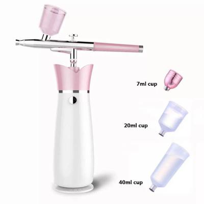 China Mini Compressor Portable Cordless Airbrush Facial Sprayer Beauty Equipment for sale