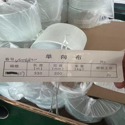 China Tejido de fibra de vidrio unidireccional 227g/m2 de ancho 200mm, longitud 330 metros por rollo Corte suave para tanques de almacenamiento enormes en venta