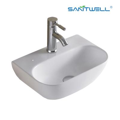 China Os mercadorias AB8306 sanitários feitos à mão acima da bacia redonda da bacia contrária integraram a parede cerâmica Hung Wash Basin do banheiro da bacia à venda