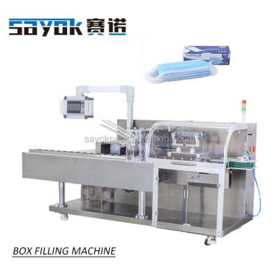 China Food Easy To Use Machine Horizontal Cartoning Box Filling Machine 50 Pieces Disposable Flat Packing Machine Box Mask for sale