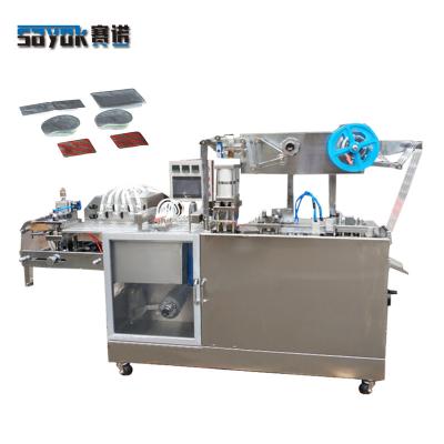 China Manual Food PILLOW PACKING MACHINE Small Tablet Blister Packing Machine for sale