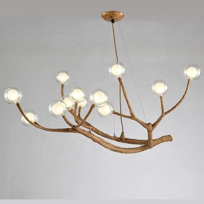 中国 Unique Design Glass Wood Branch Resin Chandelier for Hotel Lobby Cafe Exhibition Hall 販売のため