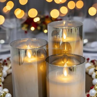 Китай Christmas Wedding Decoration LED glitter Moving Flame amber glass flameless led candles with Remote control for home decor продается