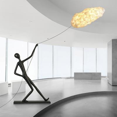 China Luxury Resin Humanoid Hand Pull Cloud Design Sense Floor Lamp for sale