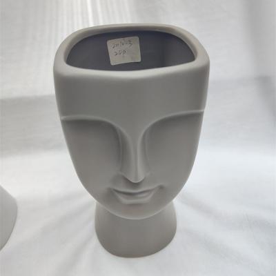 China Creative home simple warm popular minimalist large-capacity products face design decoration ceramic vase for sale