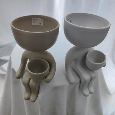 China Hot Products Art Minimalist Decorative Decorative Luxury Thug Holding Cup Shaped Ceramic Vase for sale