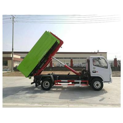 China Small Hotels 4*2 Wheeler 6 Arm 4 Ton Waste Collection Hook Lift Garbage Truck With 6CBM Manufacturer for sale