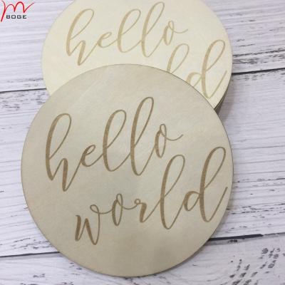 China Home Decoration Hello World Engraved Round Baby Milestone PlaquesWood Photo Monthly Prop Discs for sale