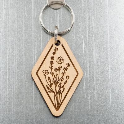 China Wood Key Custom Art Wildflower Decoration Key Chain Carving Custom Wood Key Chain for sale