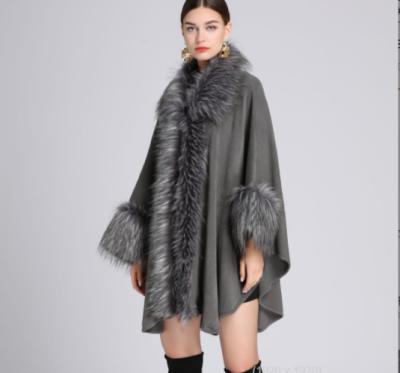 China Anti-wrinkle 2021 Autumn Winter Poncho Anti-wrinkle Cape Cloak Shawls Women's Capes Winter Women's Cape With Faux Fur Trim for sale