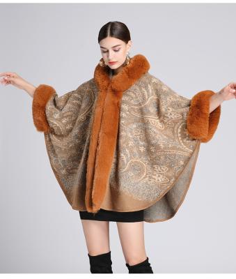 China 2021 Fashion Women's Clothing Anti-wrinkle Tassel Faux Fur Coat Shawl Loose Elegant Loose Women's Winter Bottom Coat for sale