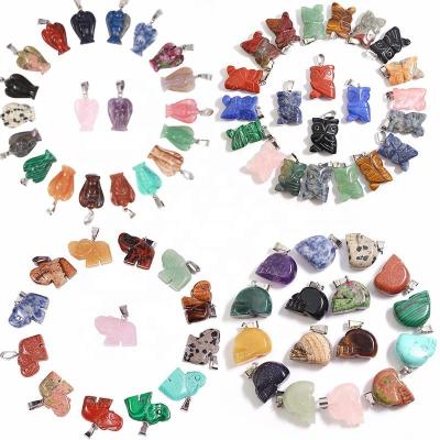 China Charm Natural Chakra Hand Carved Charm Crystal Animal Stone Bear Angel Skull Healing Reiki Pendant Wholesale For Men for sale