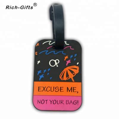 China Creative Hotel and Resort Suitcase Shape LOGO Soft Rubber Luggage Tags for sale