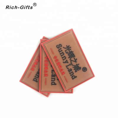 China Sustainable Customized Logo Soft Rubber Pvc Jeans Label for sale