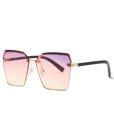 China New fashion sunglasses 36021 frameless scuffing sunglasses European and American sunglasses women's ocean fashion border sunglasses for sale