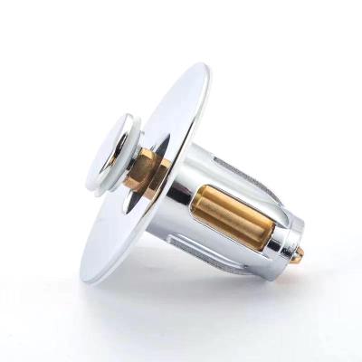 China Universal Modern Brass Lavatory Rebound Drain Filter Pop Up Bathroom Sink Drain Stopper for sale