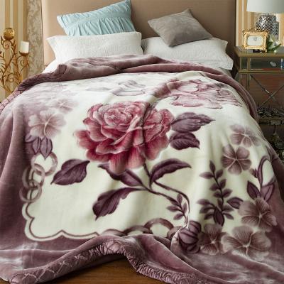 China Anti-Static European and American Style style winter 2.5-7kg full flower printed blankets warmer plush knit turkish raschel warm blanket for sale